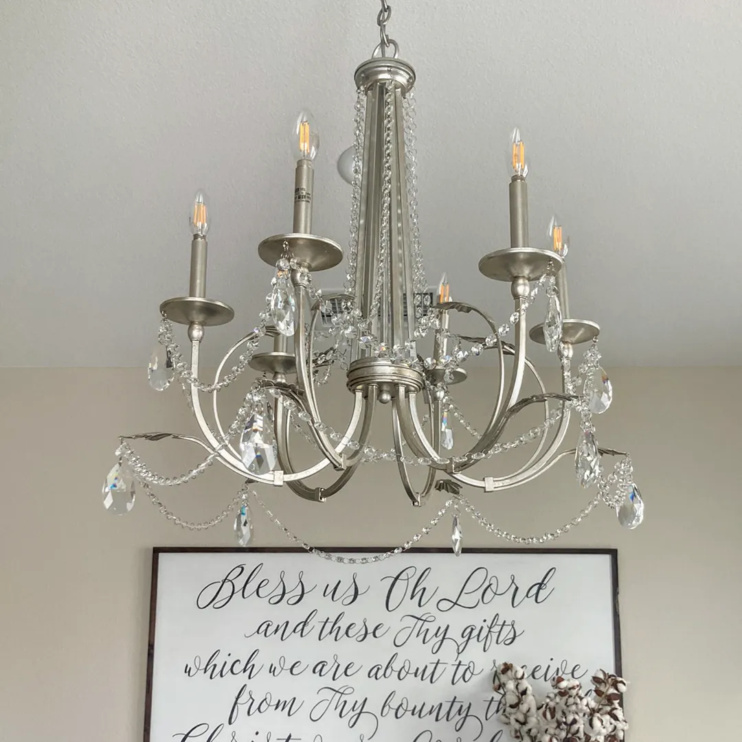 Crystal chandelier installed in a dining room