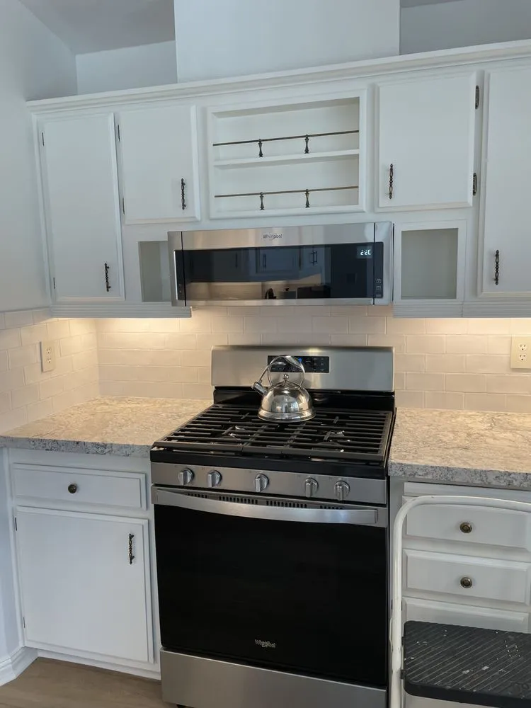 Bright remodeled kitchen with new lighting